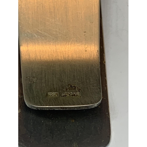 525 - A MARKED SILVER MONEY CLIP