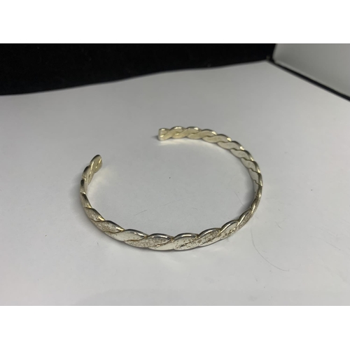 533 - TWO SILVER BANGLES