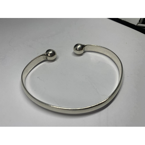 533 - TWO SILVER BANGLES