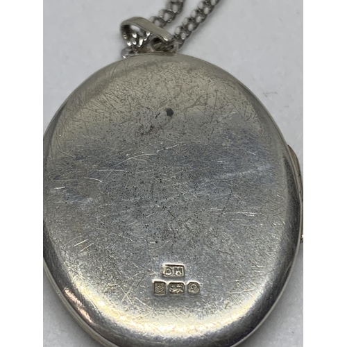 536 - A SILVER NECKLACE WITH HALLMARKED BIRMINGHAM SILVER LOCKET IN A PRESENTATION BOX