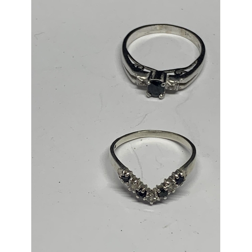 552 - FOUR VARIOUS SILVER RINGS