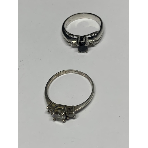 562 - FOUR VARIOUS SILVER RINGS