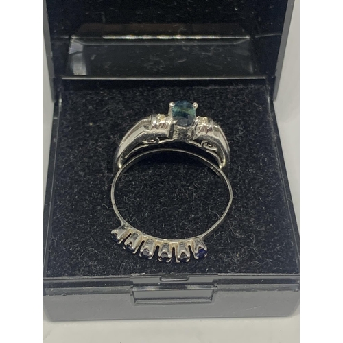 563 - TWO SILVER RINGS WITH SAPPHIRES IN A PRESENTATION BOX