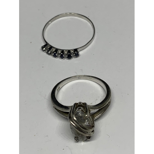 564 - FOUR VARIOUS SILVER RINGS