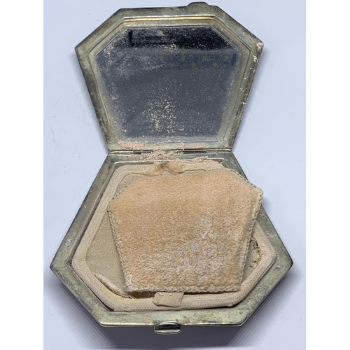 569 - A HALLMARKED BIRMINGHAM SILVER COMPACT