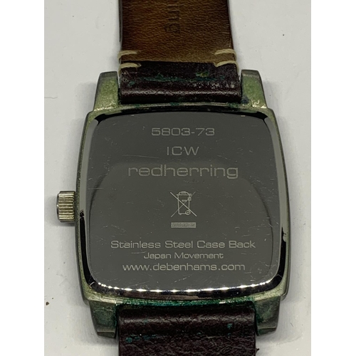 594 - A RED HERRING WRIST WATCH SEEN WORKING BUT NO WARRANTY