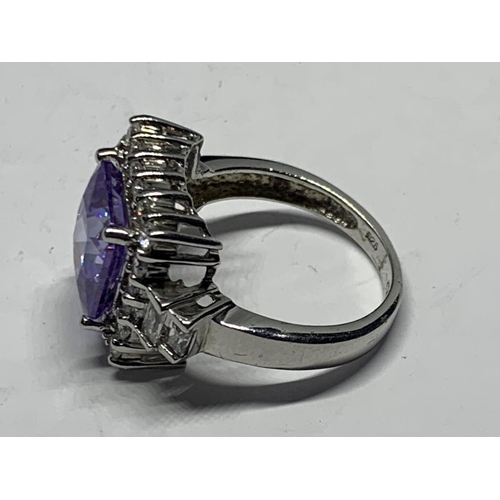 613 - A SILVER AND AMETHYST RING SIZE P IN A PRESENTATION BOX