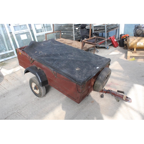 101 - A SMALL WOODEN TWO WHEEL TRAILER NO VAT