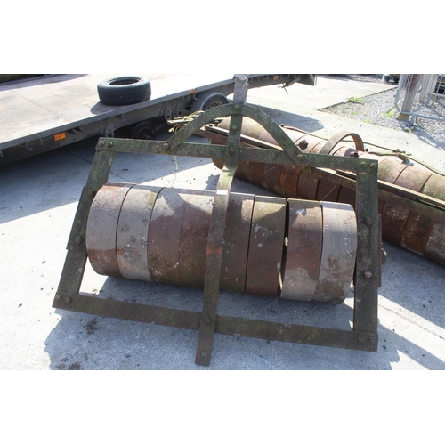 253 - A PAIR OF SEGMENT ROLLERS + VAT