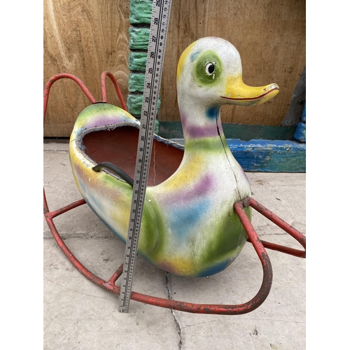 1505 - A VINTAGE PLASTIC CHILDS ROCKING DUCK WITH METAL FRAME