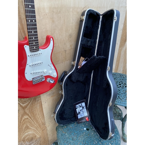 1514 - A RED FENDER STRATOCASTER ELECTRIC GUITAR WITH FENDER CARRY CASE CONTAINING ACCESSORIES (SERIAL NUMB... 