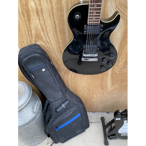 1516 - A BLACK TANGLEWOOD GUITAR COMPANY ELECTRIC GUITAR WITH A CARRY CASE, MADE IN JAPAN