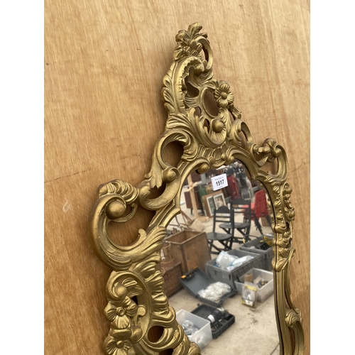 1517 - A DECORATIVE GILT FRAMED WALL MIRROR