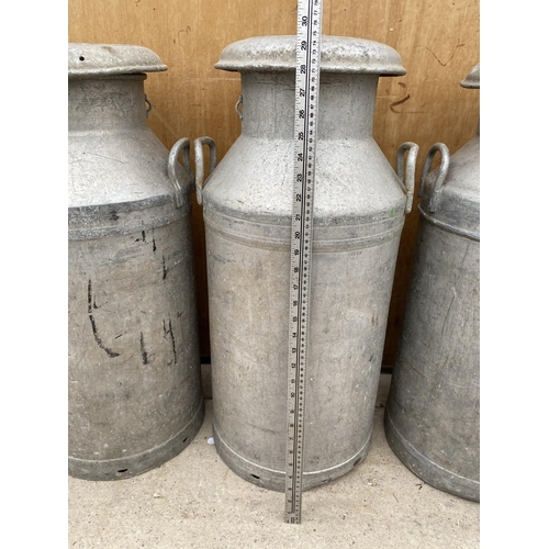 1520 - AN ALUMINIUM MILK CHURN COMPLETE WITH LID