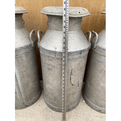 1521 - AN ALUMINIUM MILK CHURN COMPLETE WITH LID