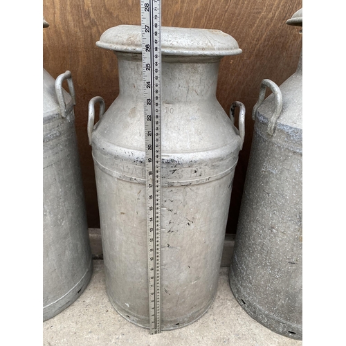 1523 - AN ALUMINIUM MILK CHURN COMPLETE WITH LID