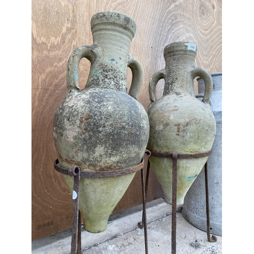 1528 - A PAIR OF METAL PLANT POT HOLDERS COMPLETE WITH TWO TERRACOTTTA URNS (H:79CM)