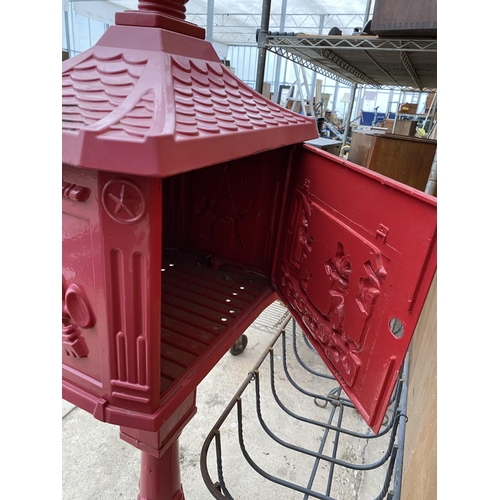 1530 - A DECORATIVE RED METAL POST BOX ON PEDESTAL BASE (H:118CM)