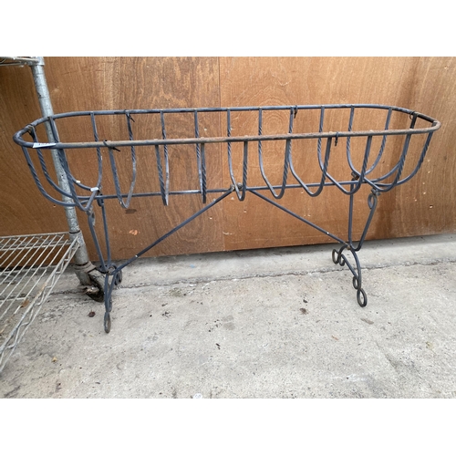 1531 - A WROUGHT IRON HAYRACK TROUGH PLANTER ON LEGS (L:91CM)