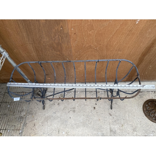 1531 - A WROUGHT IRON HAYRACK TROUGH PLANTER ON LEGS (L:91CM)