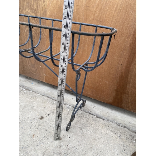 1531 - A WROUGHT IRON HAYRACK TROUGH PLANTER ON LEGS (L:91CM)