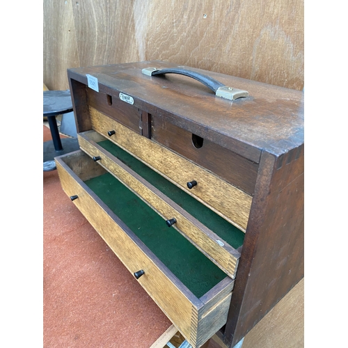 1541 - A VINTAGE FIVE DRAWER WOODEN JOINERS CHEST BEARING THE LABEL ' MADE IN EMIR LONDON ENGLAND'