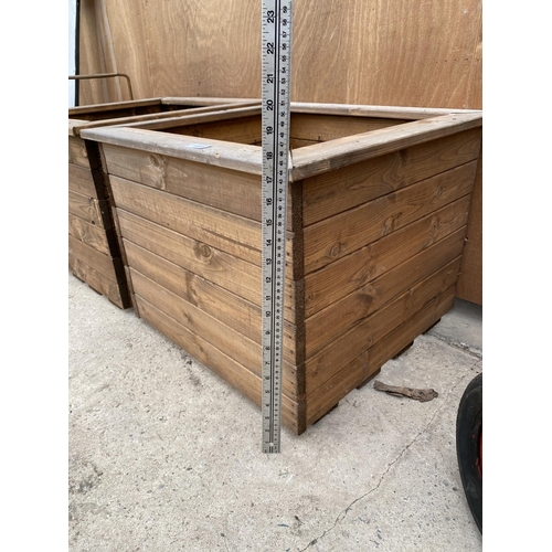 1553 - TWO LARGE WOODEN PLANTERS HEIGHT 46CM, WIDTH 57CM, DEPTH 57CM - NO VAT