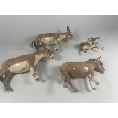 712 - A GROUP OF FOUR BESWICK DONKEY FIGURES, ONE LEG A/F