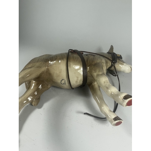 718 - A SYLVAC DONKEY FIGURE WITH LEATHER REIGNS