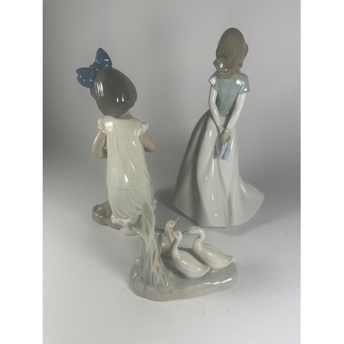 742 - THREE NAO LLADRO FIGURES TO INCLUDE GIRL WITH DOG ETC