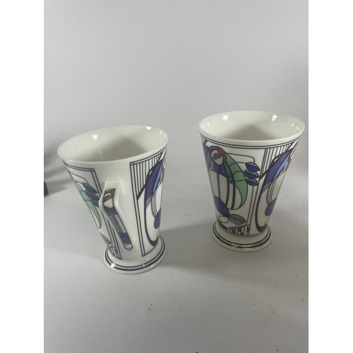 769 - A SET OF FOUR WREN RENNIE MACKINTOSH PATTERN MUGS