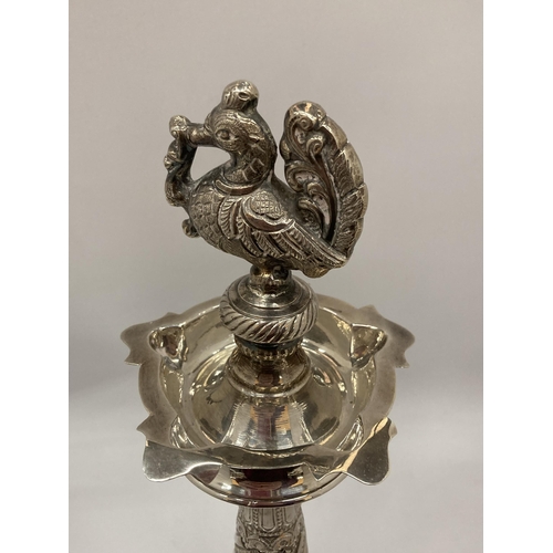 16 - A LARGE , BELIEVED INDIAN SILVER, WHITE METAL STAND WITH BIRD DESIGN TOP, WITH PRESENTATION ENGRAVIN... 