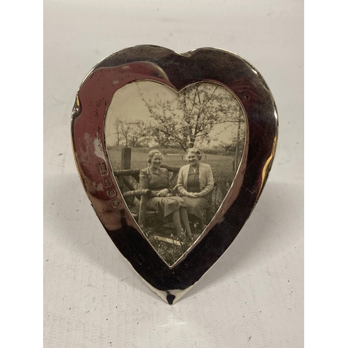 49 - A VICTORIAN HALLMARKED SILVER HEART SHAPED PHOTO FRAME