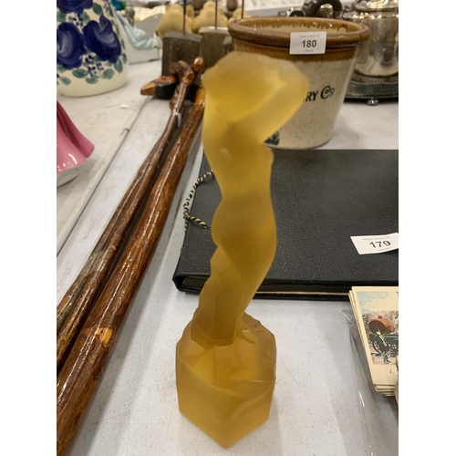 169 - A VINTAGE AMBER GLASS ART DECO FIGURE OF A LADY HEIGHT 18CM