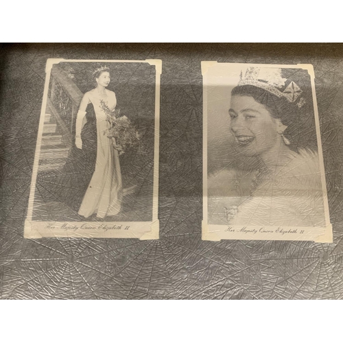 179 - A VINTAGE PHOTOGRAPH ALBUM CONTAINING A QUANTITY OF ROYAL COMMEMORATIVE POSTCARDS OF QUEEN ELIZABETH... 