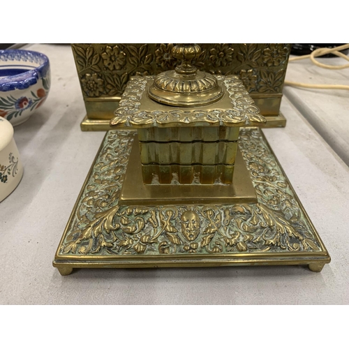 191 - AN ASIAN STYLE BRASS STATIONERY BOX WITH COMPARTMENTS AND INKWELL WITH GLASS LINER, BOTH WITH FLORAL... 