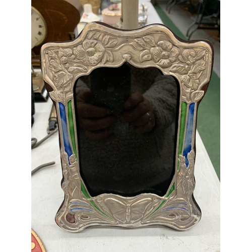 196 - AN ART NOUVEAU STYLE STERLING SILVER AND ENAMEL PHOTO FRAME