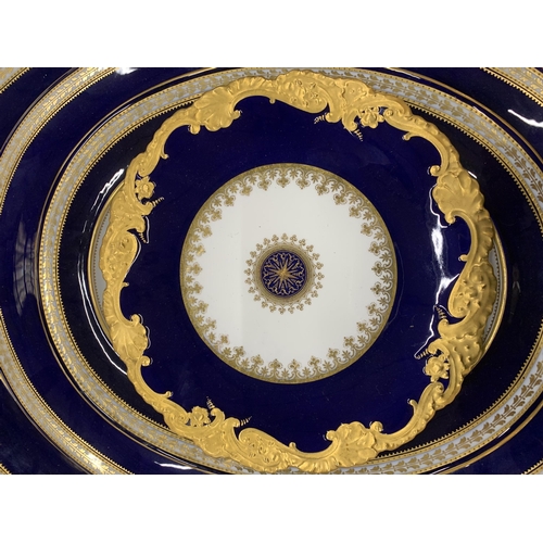 211 - A QUANTITY OF SPODE TO INCLUDE SERVING PLATTERS, BOWLS, PLATES, ETC, IN COBALT BLUE WITH GILT DECORA... 