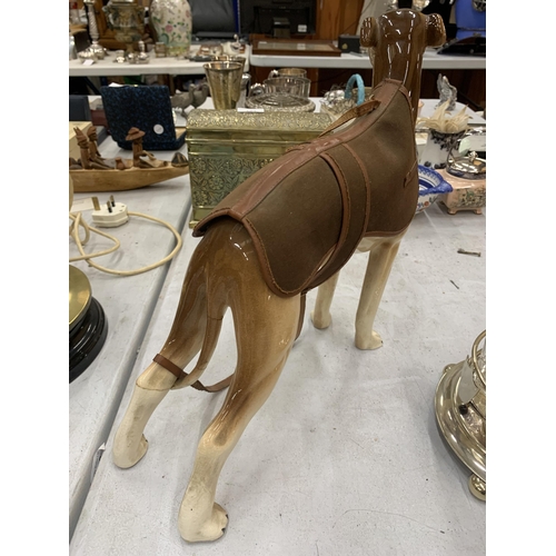 218 - A LARGE MELBA WARE MODEL OF A GREYHOUND HEIGHT 30CM - A/F LEG HAS BEEN BROKEN