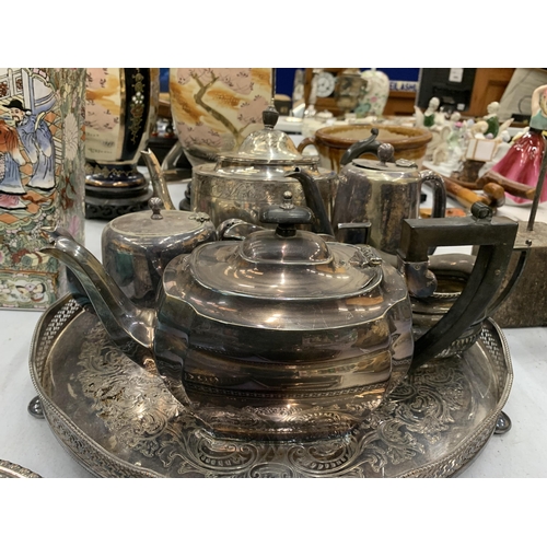 226A - A QUANTITY OF SILVER PLATE TO INCLUDE A TRAY , TEA AND COFFE POTS, JUGS, ETC