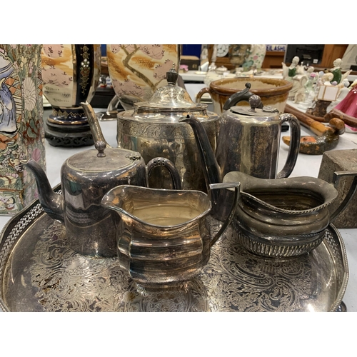 226A - A QUANTITY OF SILVER PLATE TO INCLUDE A TRAY , TEA AND COFFE POTS, JUGS, ETC