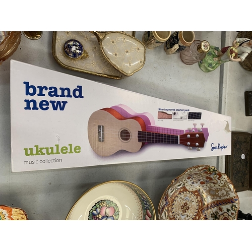 256 - AN AS NEW BOXED UKELELE