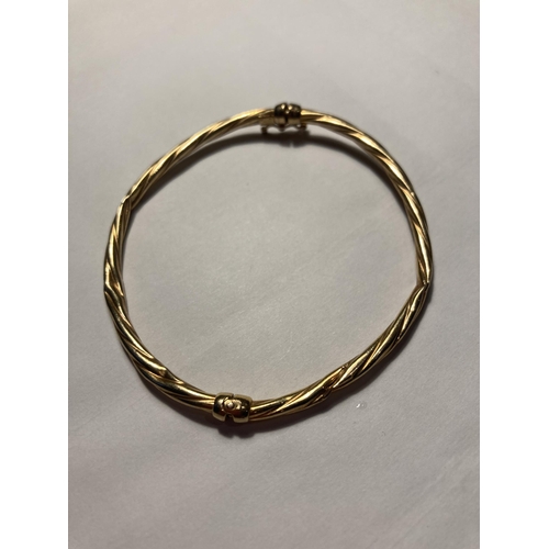 502 - A 9 CARAT GOLD BANGLE GROSS WEIGHT 3.27 GRAMS