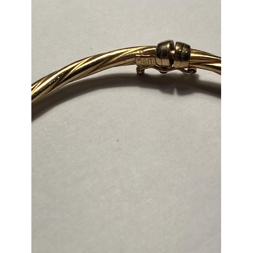 502 - A 9 CARAT GOLD BANGLE GROSS WEIGHT 3.27 GRAMS