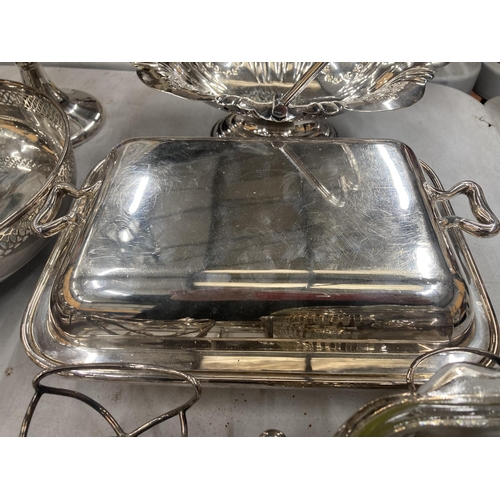 824 - A QUANTITY OF SILVER PLATED ITEMS TO INCLUDE A FOOTED BOWL, TAZA DISH, BASKET DISH, SALT, PEPPER AND... 