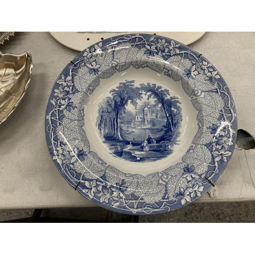 845 - A LARGE VINTAGE CERAMIC PLATTER WITH FLORAL DESIGN, A BLUE AND WHITE BOWL AND A VINTAGE DRAINAGE PLA... 