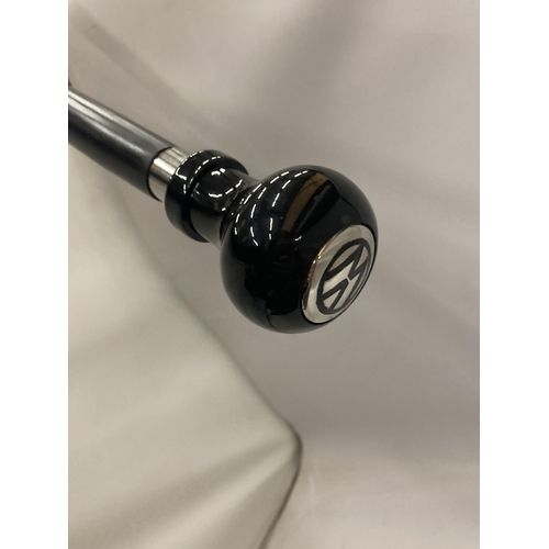 857 - A WALKING STICK WITH VW LOGO