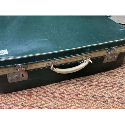 884 - A VINTAGE GREEN LEATHER SUITCASE