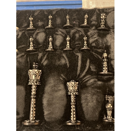 891 - AN INDIAN STYLE BOXED SET OF CHESS PIECES