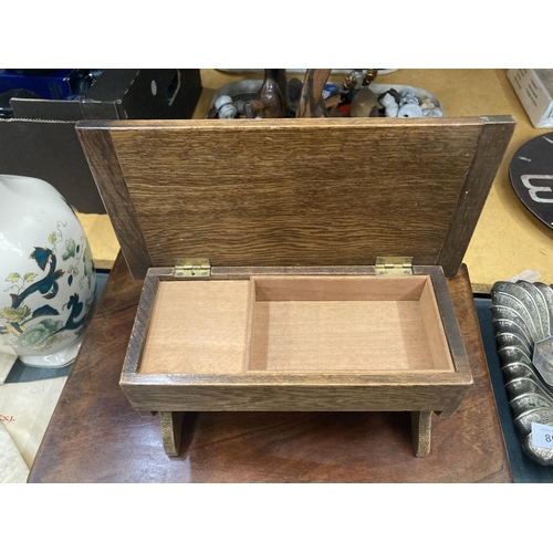 917 - A VINTAGE MAHOGANY BOOK SHELF PLUS A MUSICAL BOX IN THE SHAPE OF A TABLE